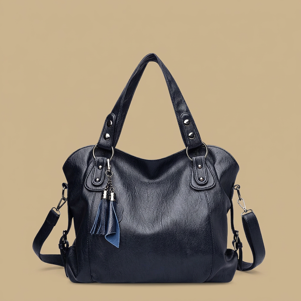 Sac cabas Yube en simili cuir clouté à pompon