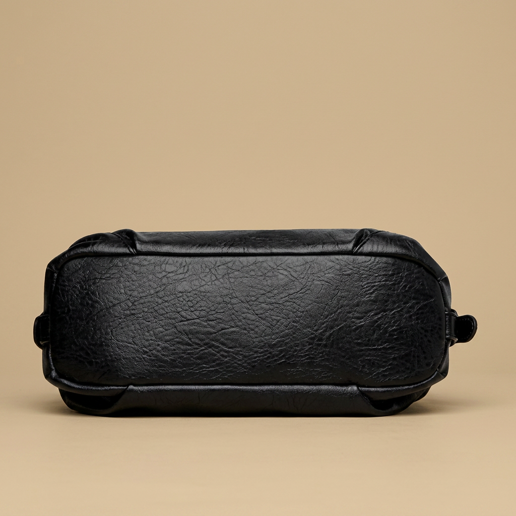 Sac cabas Yube en simili cuir clouté à pompon